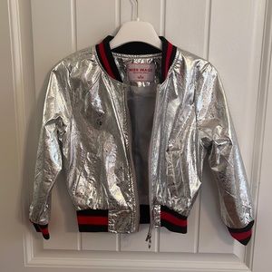 Silver varsity jacket. Pleather like material . size 4.